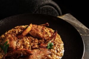 Risoto de codorna e supreme grelhado com limão siciliano tostado. Foto: Rubens Kato