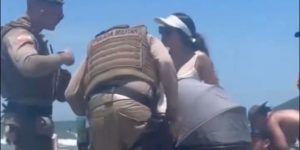 Bebê exposto ao sol e som alto em Balneário Camboriú gera alerta