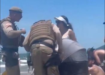 Bebê exposto ao sol e som alto em Balneário Camboriú gera alerta