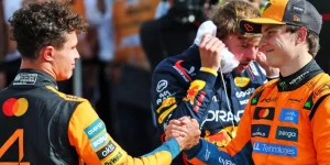 Lando Norris celebrates his second position with third placed teammate Oscar Piastri