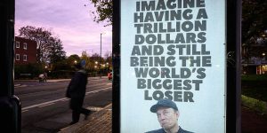 Elon Musk Activist Group Installs Faux 'Blue Plaque' At Tesla Showroom In Tottenham