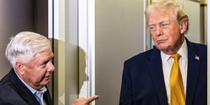 Donald Trump, right, and Lindsey Graham stand near each other on a plane