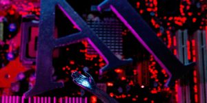 Illustration shows AI (Artificial Intelligence) letters and robot hand