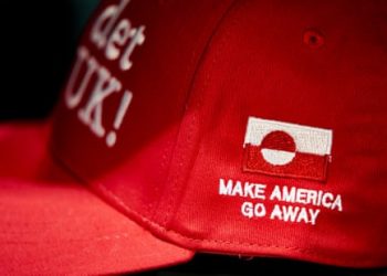 Maga cap embroidered with a slogan reading 'Now it's NUUK!' and 'Make America go away' is displayed for sale in Copenhagen
