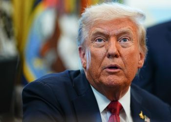 Closeup of US President Donald Trump as he speaks in the Oval Office of the White House