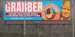 A highway billboard in Birmingham criticizes President Trump's action in Venezualla