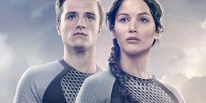 m colorida de Jennifer Lawrence e Josh Hutcherson como Katniss e Peeta em Jogos Vorazes