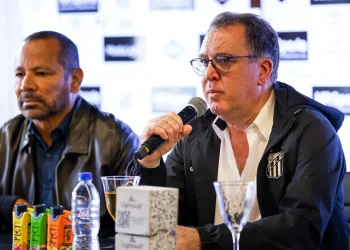 The Santos FC President Marcelo Teixeira speaks alongside Neymar da Silva Santos, Neymar Jr's father