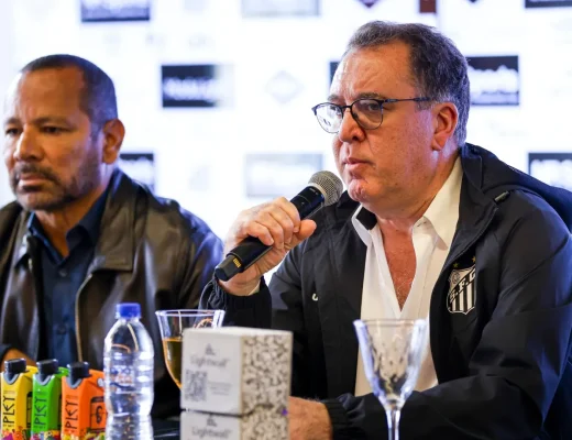 The Santos FC President Marcelo Teixeira speaks alongside Neymar da Silva Santos, Neymar Jr's father