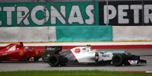 Sergio Perez leads Fernando Alonso in the 2012 Malaysian Grand Prix