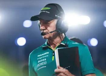 Adrian Newey clutching his notebook on the grid in Qatar
