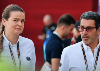 Claire Dubbelman and Rui Marques walk through the paddock in Qatar