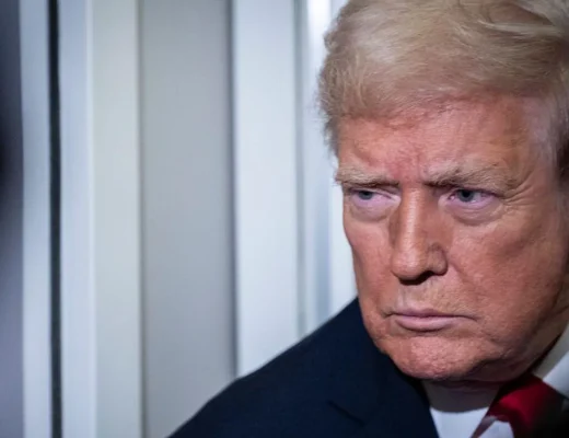 Getty Images A close photo of Trump, who is wearing a dark suit and red tie