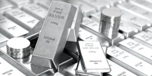 Pile of Fine Silver Bars and Coins Investment and Precious Metals
