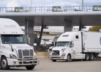 Commercial trucks cross into Canada from the US at the Blue Water Bridge border crossing in Sarnia, Ontario, on Friday