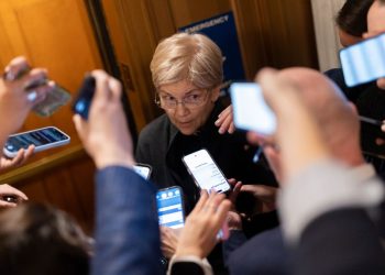 Sen. Elizabeth Warren talks with reporters after a Senate Democratic Caucus meeting at the US Capitol on November 9, 2025