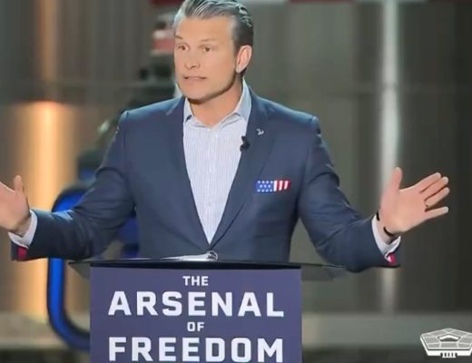 Pete Hegseth speaking at a podium with "The Arsenal of Freedom" written on it.