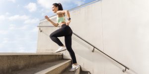Beautiful asian woman outdoor exercise She un up the stairs