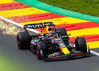 Max Verstappen with a sparking Red Bull.