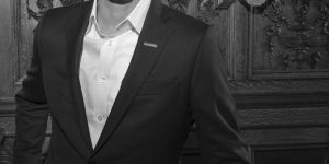 A black and white portrait of Josh Shapiro