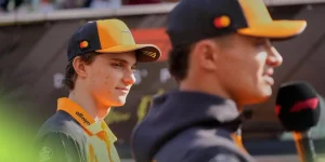 Oscar Piastri watches his teammate Lando Norris speak to media before the Abu Dhabi Formula One Grand Prix