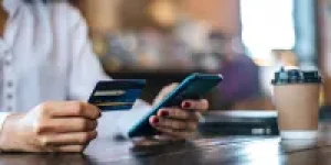 pay-goods-by-credit-card-through-smartphone-coffee-shop