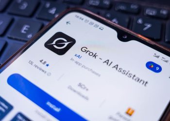 illustration, the Grok AI app is seen displayed on a smartphone