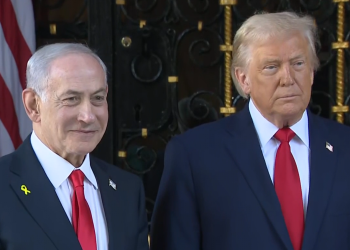 Mr Trump and Benjamin Netanyahu speak outside Mar-a-Lago