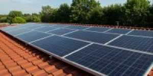 solar-panels-red-tile-roof-with-clear-blue-sky-background