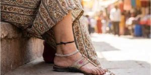 Por que usar um fio preto no verão: Misticismo e proteção