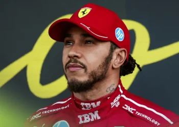 Lewis Hamilton looks on in the pit lane after Mexican Grand Prix qualifying