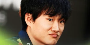 Yuki Tsunoda eyes the camera as he faces the media in Abu Dhabi